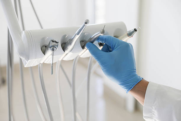 Professional Root Canal Treatment technician working in Shelby, MI